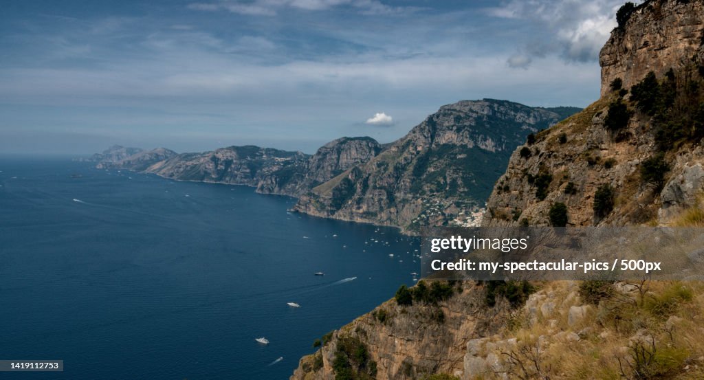 Scenic view of sea and mountains against sky,Positano,Salerno,Italy