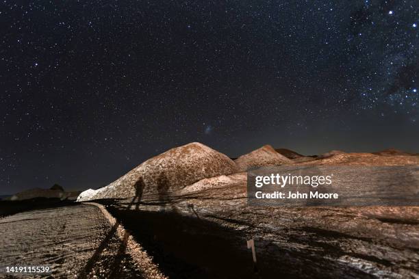 The Milky Way appears over salt formations in the Valle de la Luna in the Atacama Desert, considered the driest place on earth on August 26, 2022...