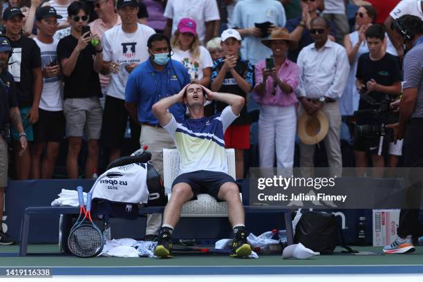 Andy Murray of Great Britain reacts after defeating Francisco Cerundolo of Argentina during the Men's Singles First Round on Day One of the 2022 US...