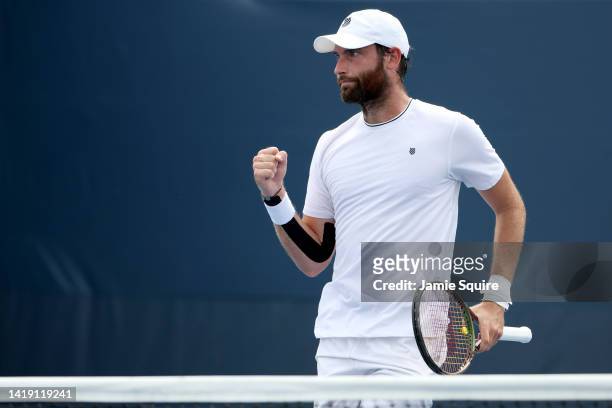 Quentin Halys of France reacts to a point against Arthur Rinderknech of France during the Men's Singles First Round on Day One of the 2022 US Open at...