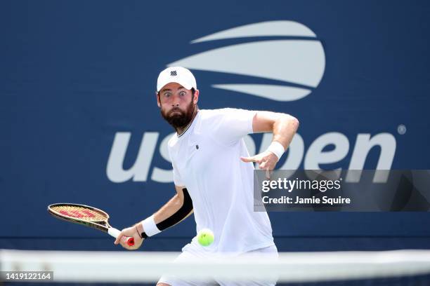 Quentin Halys of France plays a forehand against Arthur Rinderknech of France during the Men's Singles First Round on Day One of the 2022 US Open at...