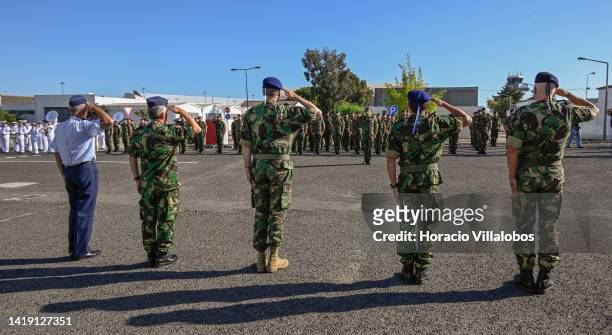 The Chief of Staff of the Navy Admiral Henrique Gouveia e Melo salutes as the national anthem is being played during the welcome ceremony of Marines...
