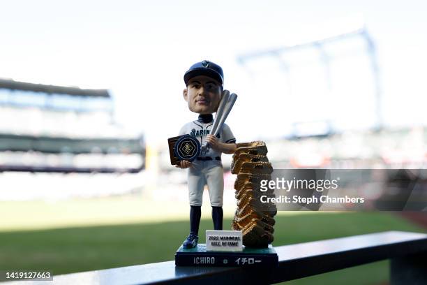 An Ichiro Suzuki bobblehead doll is seen before the game between the Seattle Mariners and the Cleveland Guardians during Ichiro Suzuki's Seattle...