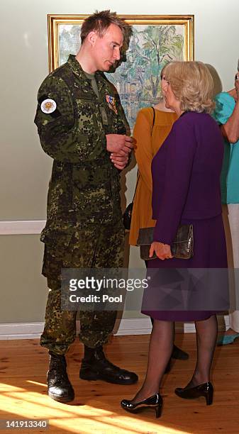 Camilla, Duchess of Cornwall, speaks to veterans from the war in Afghanistan during a reception at Kastellet Northern Depot, at the National Memorial...