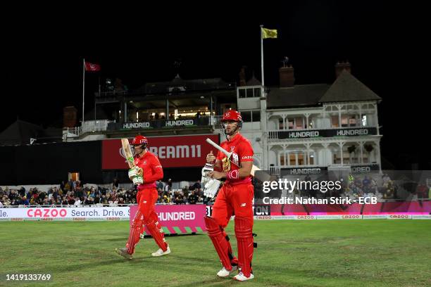 Joe Clarke and Tom Banton of Welsh Fire walk out to bat during The Hundred match between Trent Rockets Men and Welsh Fire Men at Trent Bridge on...