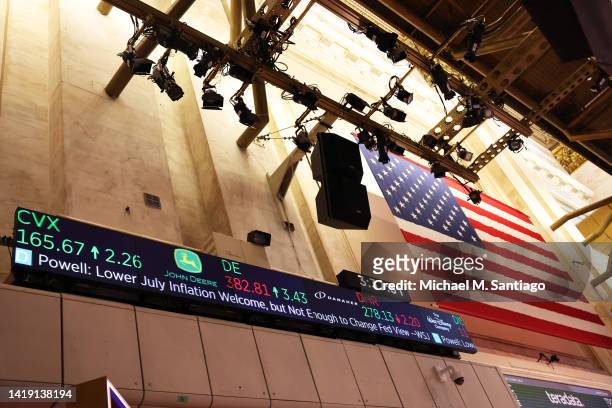Financial News is seen on a ticker as traders work on the floor of the New York Stock Exchange during afternoon trading on August 29, 2022 in New...