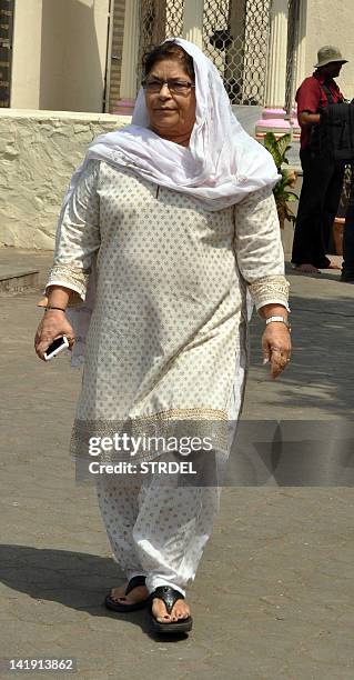 Indian Bollywood choreographer Saroj Khan attends the funeral of producer Mona Kapoor in Mumbai on March 26, 2012. AFP PHOTO/STR