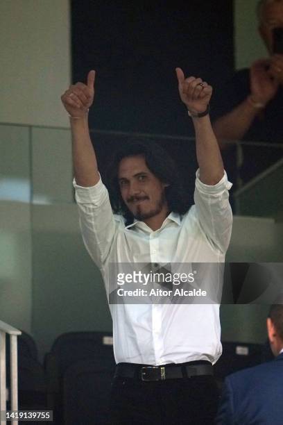 New signing Edinson Cavani of Valencia CF gestures in the stands prior to the LaLiga Santander match between Valencia CF and Atletico de Madrid at...