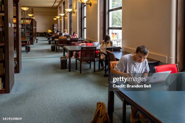 Students study in the Rice University Library on August 29, 2022 in Houston, Texas. U.S. President Joe Biden has announced a three-part plan that...