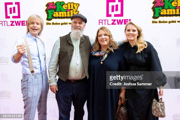 John Kelly, Paul Kelly, Kathy Kelly and Patricia Kelly attend "The Kelly Family – Die Reise Geht Weiter" premiere at Residenz Kino on August 29, 2022...