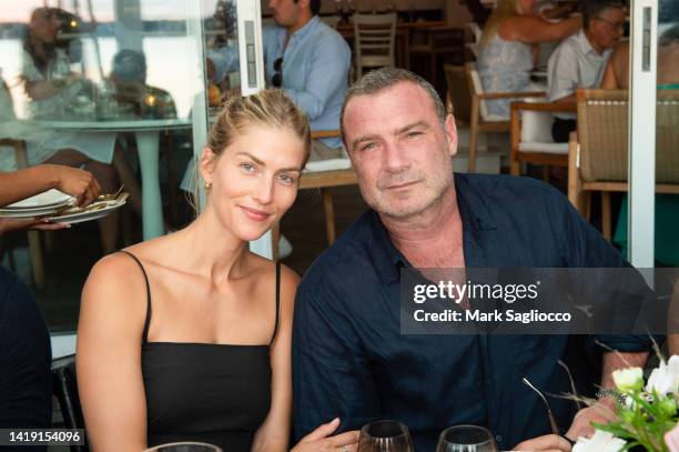 Taylor Neisen and Liev Schreiber attend the Hamptons Magazine Fall Fashion event with Zadig and Voltaire at Si Si Restaurant on August 28, 2022 in...