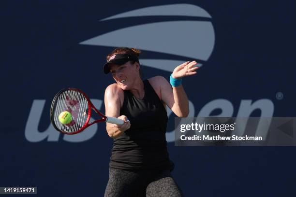 Madison Brengle of the United States plays a forehand against Ons Jabeur of Tunisia during the Women's Singles First Round on Day One of the 2022 US...