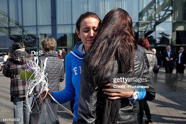 Members of the public outside the Soeverein Arena during the funeral ceremony for those who died in the Sierre Bus Crash on March 22, 2012 in...