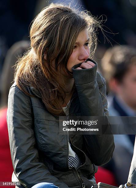 Members of the public outside the Soeverein Arena during the funeral ceremony for those who died in the Sierre Bus Crash on March 22, 2012 in...