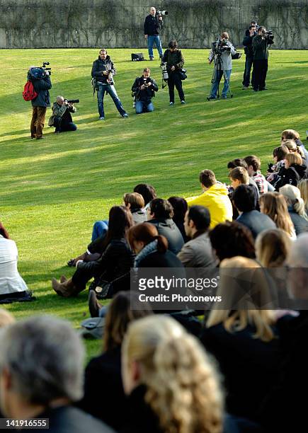 Members of the public outside the Soeverein Arena during the funeral ceremony for those who died in the Sierre Bus Crash on March 22, 2012 in...