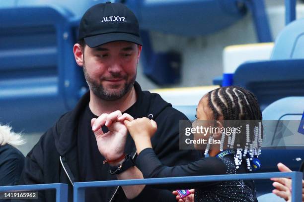 Alexis Ohanian and Alexis Olympia Ohanian Jr., husband and daughter of Serena Williams of the United States, are seen prior to Serena's match agains...