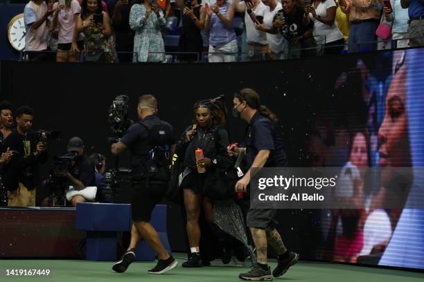 Serena Williams of the United States walks onto the court prior to her Women's Singles First Round match against Danika Kovinic of Montenegro on Day...