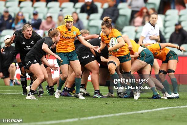 Grace Hamilton of the Wallaroos runs the ball during the O'Reilly Cup match between the Australian Wallaroos and the New Zealand Black Ferns at...