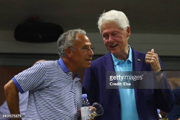 Former President of the United States Bill Clinton is seen during the Women's Singles First Round match between Serena Williams of the United States...