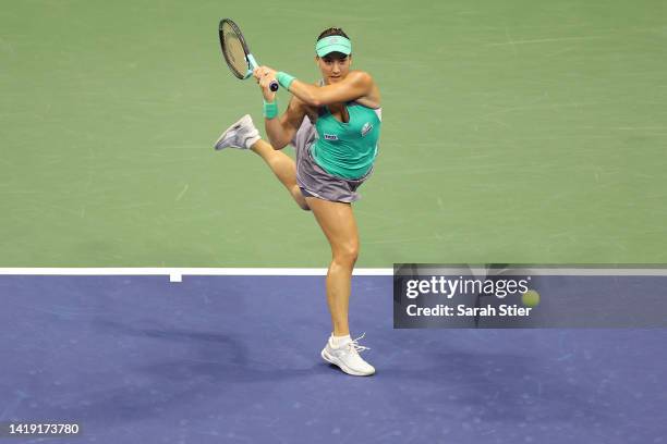 Danka Kovinic of Montenegro returns a shot against Serena Williams of the United States during the Women's Singles First Round on Day One of the 2022...