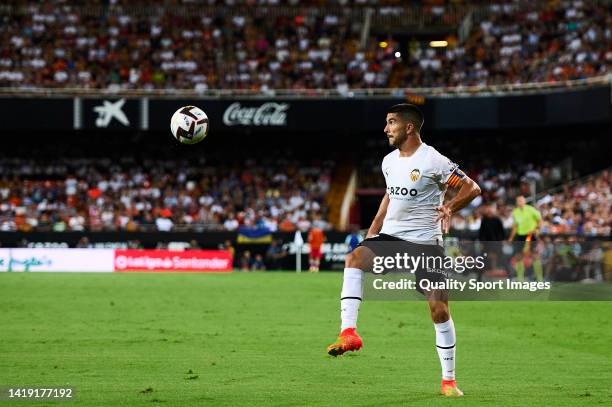 Carlos Soler of Valencia CF controls the ball during the LaLiga Santander match between Valencia CF and Atletico de Madrid at Estadio Mestalla on...