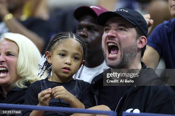 Alexis Ohanian and Alexis Olympia Ohanian Jr., husband and daughter of Serena Williams of the United States, react after Serena's win against Danka...