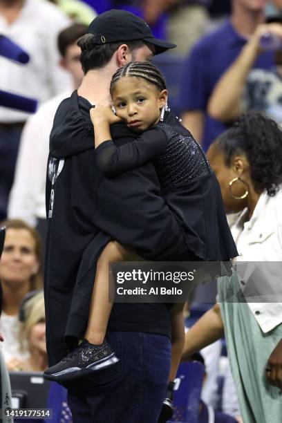 Alexis Ohanian and Alexis Olympia Ohanian Jr., husband and daughter of Serena Williams of the United States, are seen after Serena's win against...