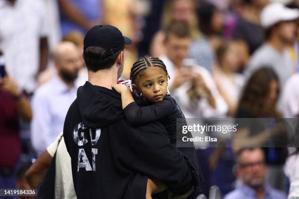 Alexis Ohanian and Alexis Olympia Ohanian Jr., husband and daughter of Serena Williams of the United States, are seen after Serena's win against...