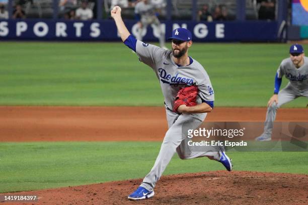 Chris Martin of the Los Angeles Dodgers throws a pitch in the tenth inning against the Miami Marlins at loanDepot park on August 29, 2022 in Miami,...