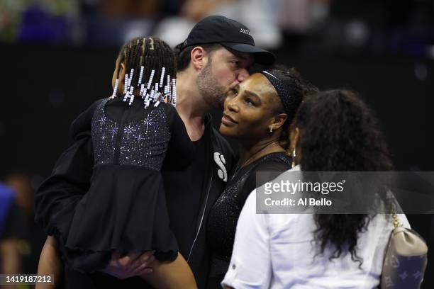 Serena Williams of the United States is greeted by her husband Alexis Ohanian following her victory against Danka Kovinic of Montenegro during the...