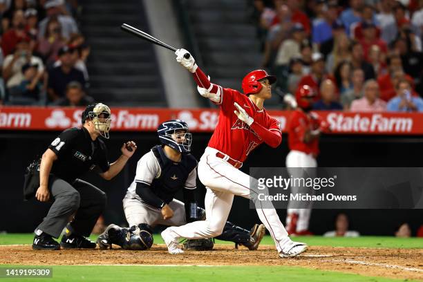 Shohei Ohtani of the Los Angeles Angels hits a two-run home run against the New York Yankees during the fifth inning at Angel Stadium of Anaheim on...