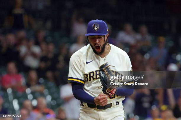 Devin Williams of the Milwaukee Brewers reacts to a strike out during the ninth inning against the Pittsburgh Pirates at American Family Field on...