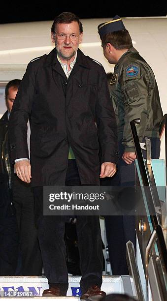 In this handout image provided by Yonhap News, Spanish Prime Minister Mariano Rajoy arrives at Incheon Airport to attend the Nuclear Security Summit...