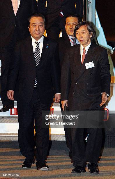 In this handout image provided by Yonhap News, Japanese Prime Minister Yoshihiko Noda arrives at Gimpo Airport to attend the Nuclear Security Summit...
