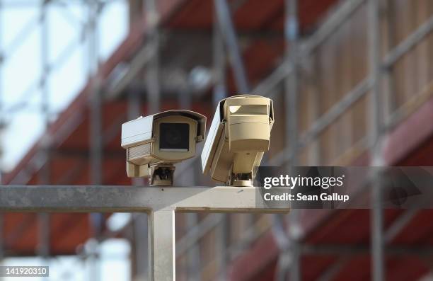 Security cameras stand on the construction site of the new headquarters of the German intelligence service, the BND , on March 26, 2012 in Berlin,...