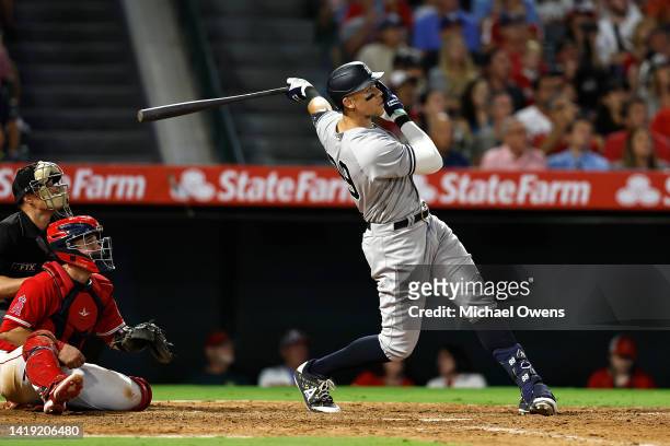 Aaron Judge of the New York Yankees hits his 50th home run of the season against the Los Angeles Angels during the eighth inning at Angel Stadium of...