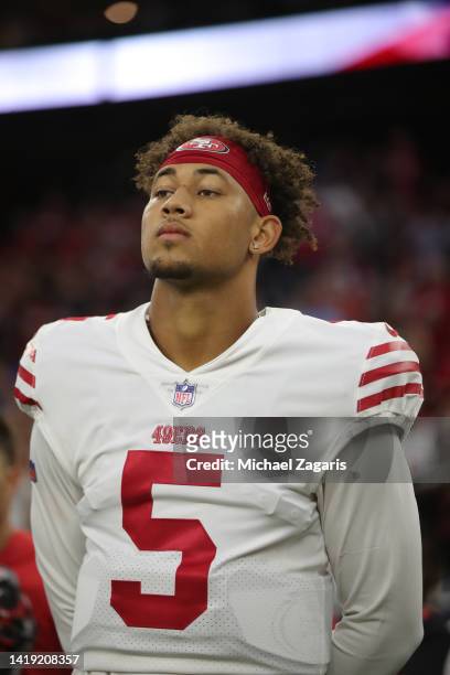 Trey Lance of the San Francisco 49ers on the sideline before the game against the Houston Texans at NRG Stadium on August 25, 2022 in Minneapolis,...