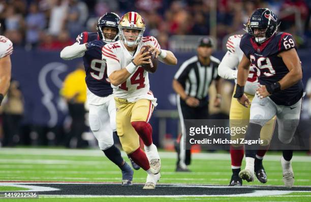Brock Purdy of the San Francisco 49ers rushes during the game against the Houston Texans at NRG Stadium on August 25, 2022 in Minneapolis, Texas. The...