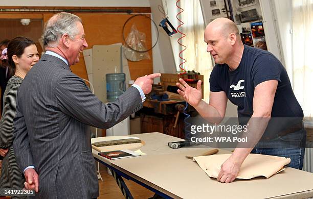 Prince Charles, Prince of Wales talks to craftsman during a visit to the Rud Rasmussen furniture warehouse on March 26, 2012 in Copenhagen, Denmark....