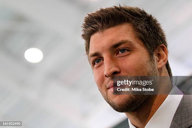 Quarterback Tim Tebow addresses the media as he is introduced as a New York Jet at the Atlantic Health Jets Training Center on March 26, 2012 in...