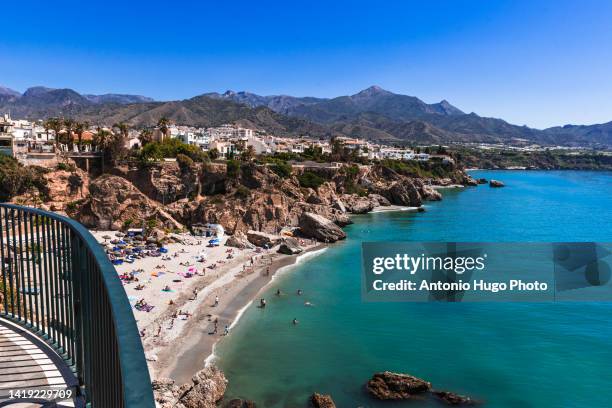 calahonda beach seen from balcon de europa in nerja, malaga, spain. - nerja stock pictures, royalty-free photos & images
