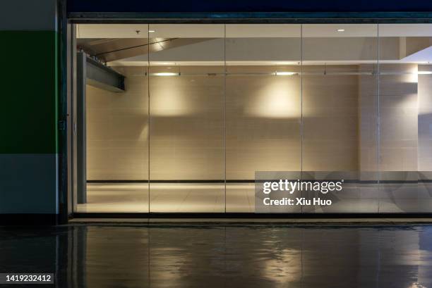 an interior space - glass entrance stock pictures, royalty-free photos & images