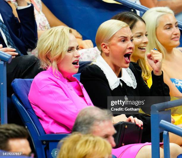 Rebel Wilson and Ramona Agruma attend the Women's Singles First Round match between Serena Williams of the United States and Danka Kovinic of...