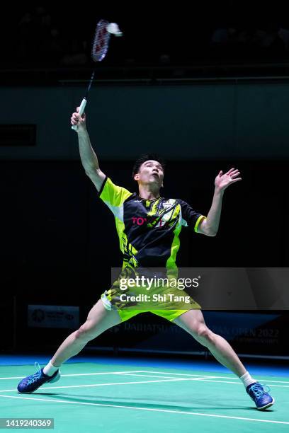 Kantaphon Wangcharoen of Thailand competes in the Men's Singles First Round match against Li Shifeng of China during day one of Daihatsu Yonex Japan...