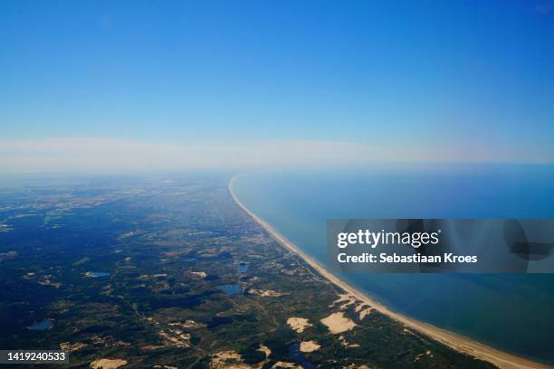 dutch coastline in the sunshine, dunes, nature, bloemendaal, the netherlands - zandvoort stock-fotos und bilder