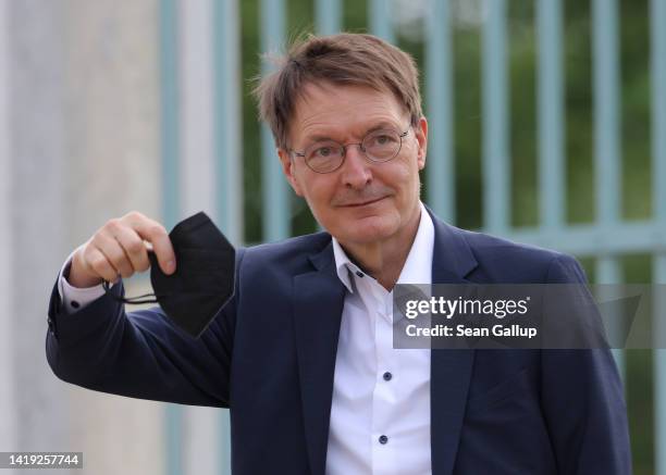 German Health Minister Karl Lauterbach arrives at a retreat of the German government cabinet at Schloss Meseberg on August 30, 2022 near Gransee,...