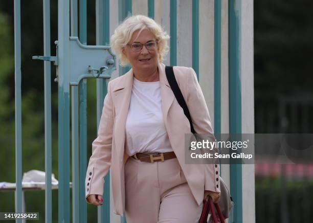 German Defense Minister Christine Lambrecht arrives at a retreat of the German government cabinet at Schloss Meseberg on August 30, 2022 near...
