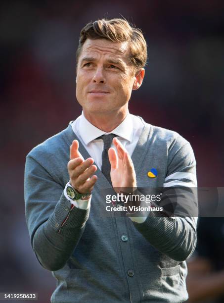 Bournemouth manager Scott Parker applauds the fans after the Premier League match between Liverpool FC and AFC Bournemouth at Anfield on August 27,...