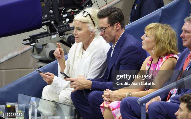 Hugh Jackman and his wife Deborra-Lee Furness attend the victory of Serena Williams of USA on Day 1 of the US Open 2022, 4th Grand Slam of the...
