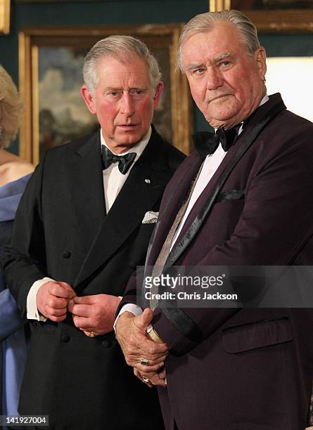 Prince Charles, Prince of Wales and Prince Henrik of Denmark take part in a receiving line ahead of an official dinner at the Royal Palace on March...